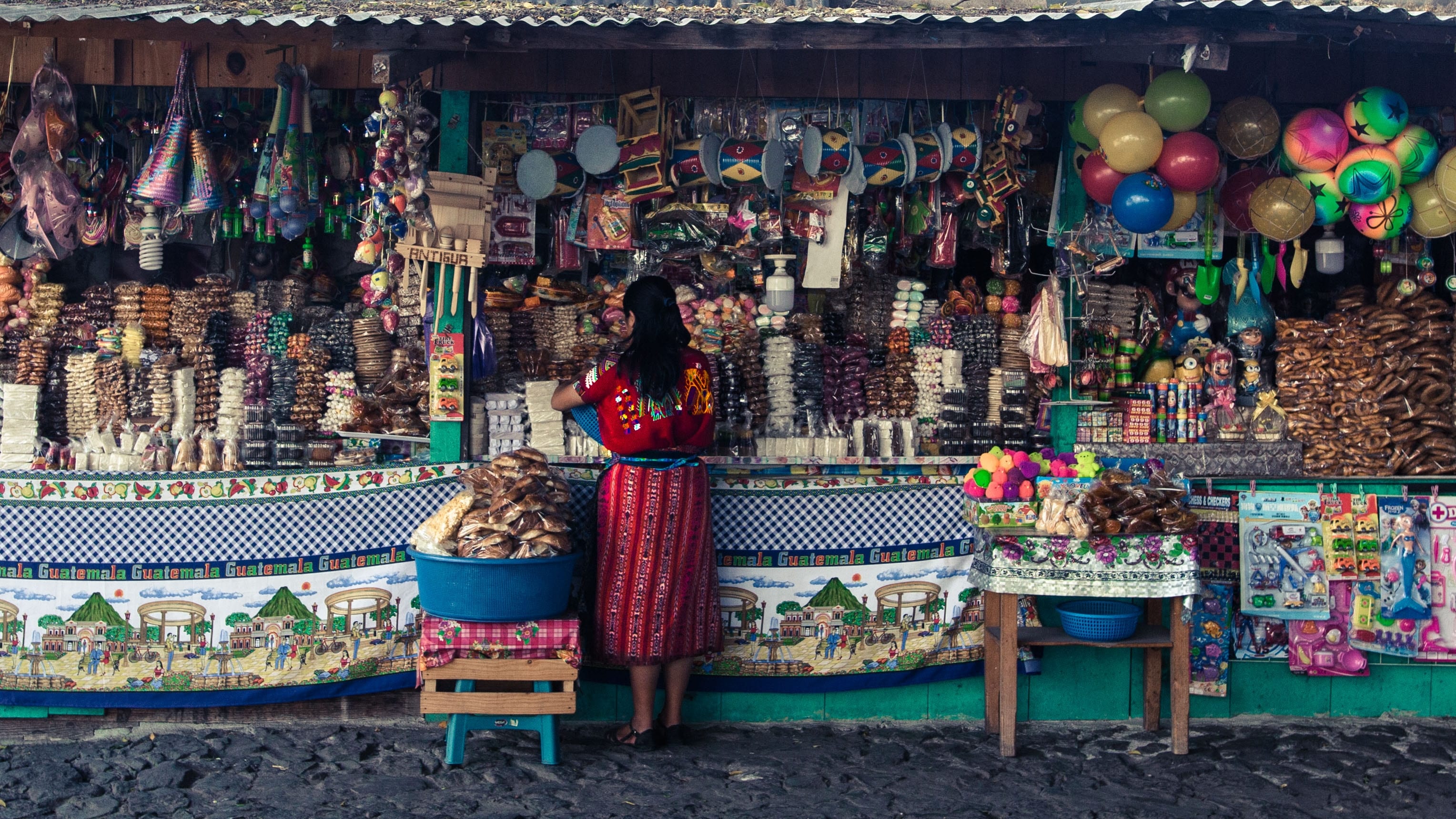 guatemala - woman shopping in local market