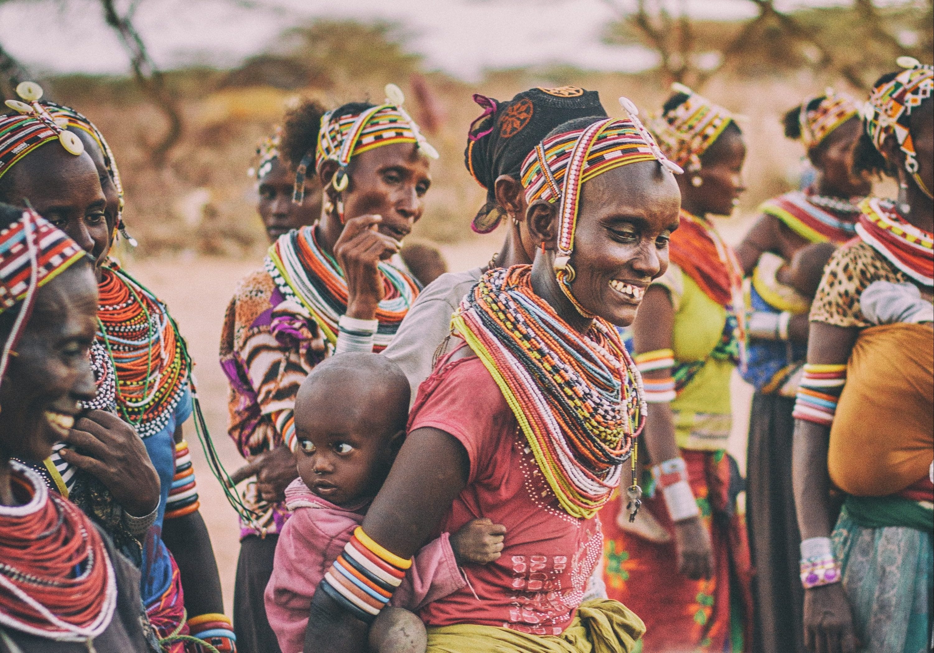 kenya tribe with happy mother holding baby