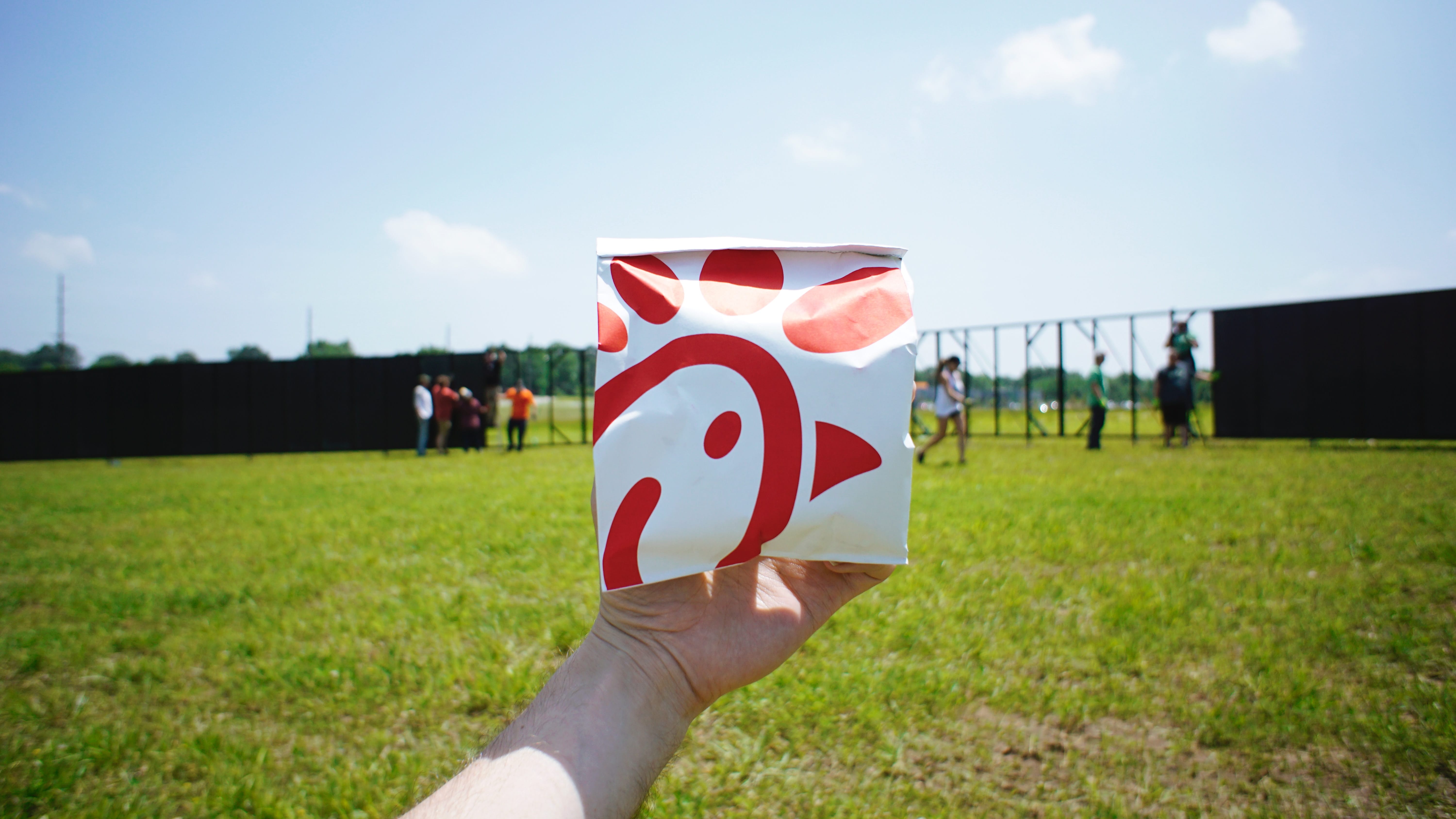 chick fil a to go bag in green field